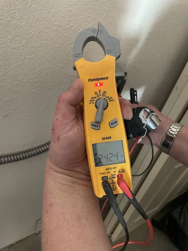 Voltage testing with clamp meter during Generator Installation in Madera Ranchos